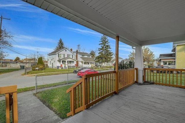 1371 E 23rd Ave, Columbus, OH 43211 - wooden porch featuring a residential view