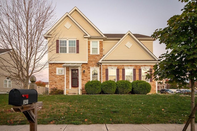 view of front of home with a front yard