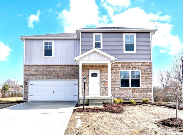 traditional-style home with a garage, concrete driveway, and stone siding