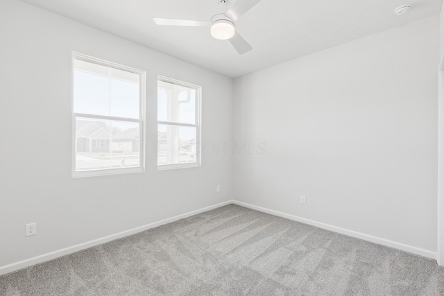 800 Heritage Blvd, Delaware, OH 43015 - spare room featuring carpet flooring, a ceiling fan, and baseboards