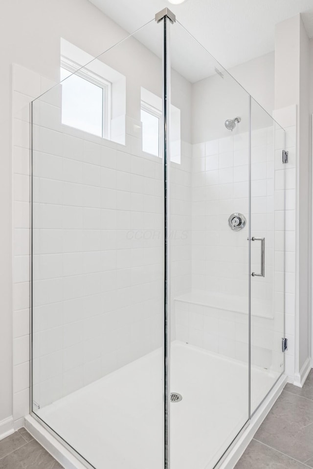 800 Heritage Blvd, Delaware, OH 43015 - full bathroom with baseboards, tile patterned flooring, and a stall shower