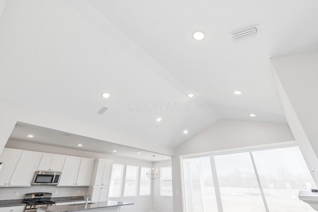 800 Heritage Blvd, Delaware, OH 43015 - details with white cabinets, dark stone countertops, stainless steel appliances, recessed lighting, and visible vents