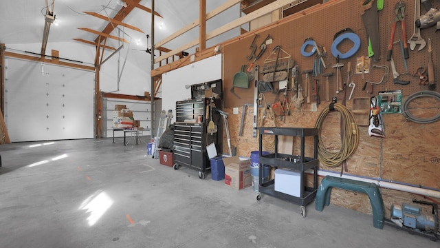 garage with a workshop area