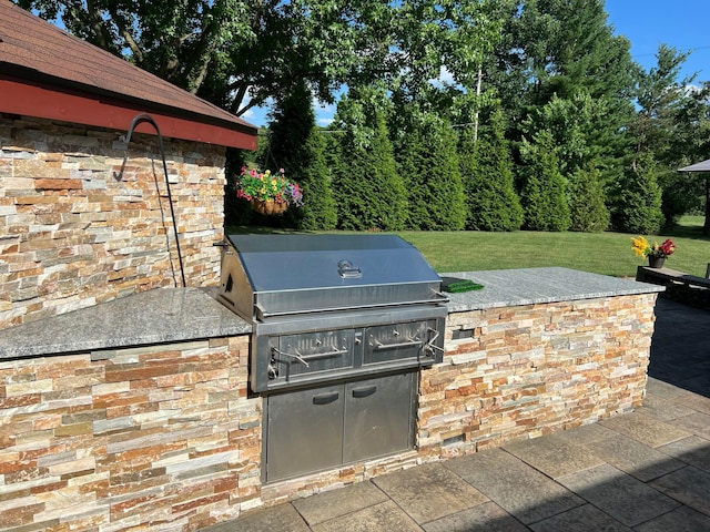 view of patio with exterior kitchen