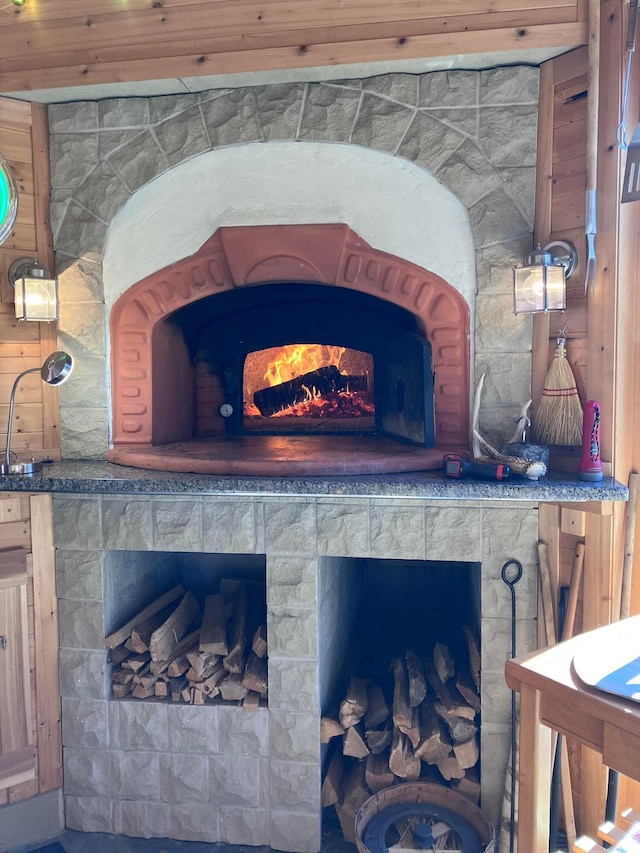 details with a tile fireplace