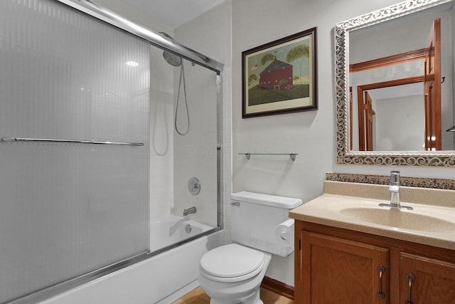 full bath with shower / bath combination with glass door, toilet, and vanity