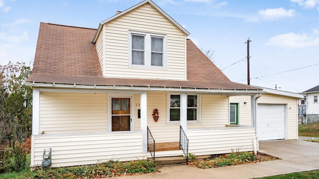 view of front facade featuring a porch and a garage