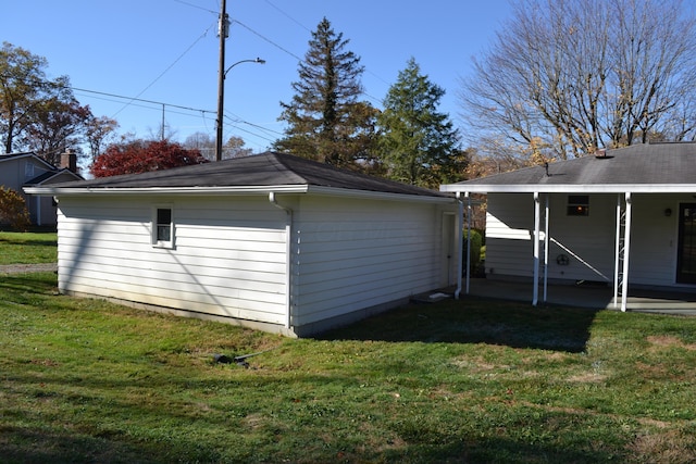 view of property exterior featuring a yard and a patio