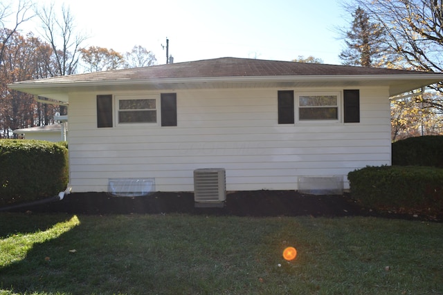 view of home's exterior featuring a lawn