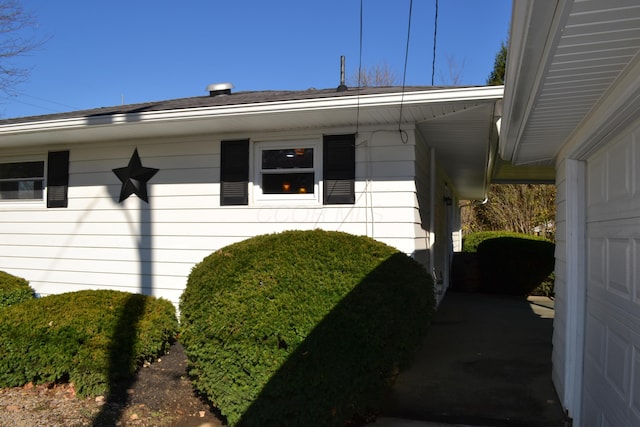 entrance to property featuring a garage