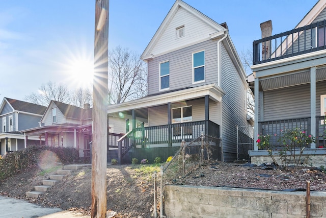 view of front property featuring covered porch