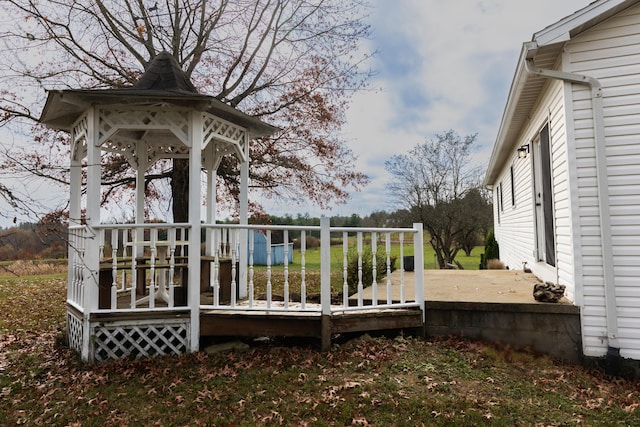 wooden terrace with a gazebo