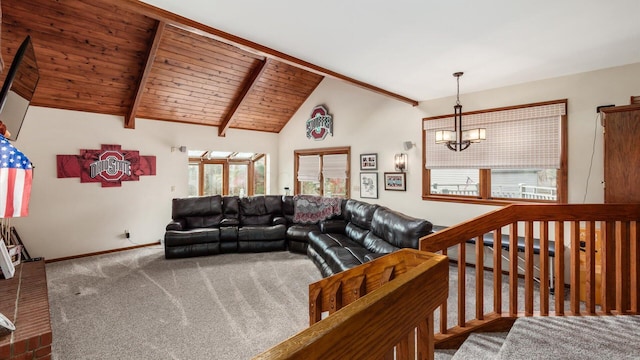 carpeted living room featuring vaulted ceiling with beams, a notable chandelier, and wood ceiling