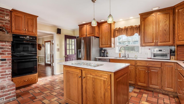 kitchen with hanging light fixtures, decorative backsplash, stainless steel fridge, double oven, and a kitchen island