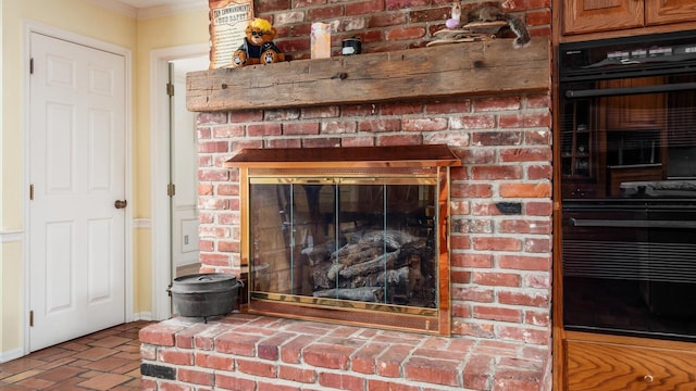 room details featuring a brick fireplace