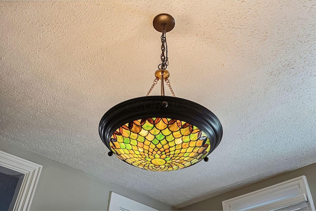 details featuring a textured ceiling