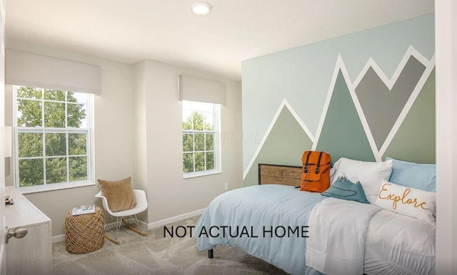 bedroom with multiple windows and carpet floors