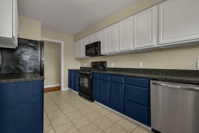 kitchen with white cabinetry, light tile patterned floors, black appliances, and blue cabinets