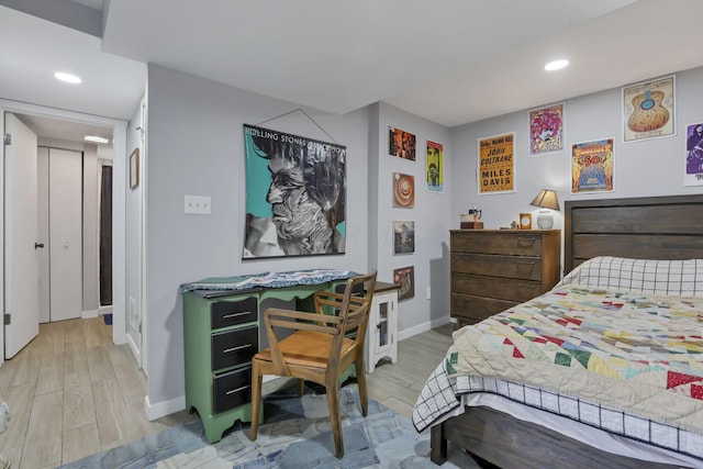 bedroom with light wood-type flooring