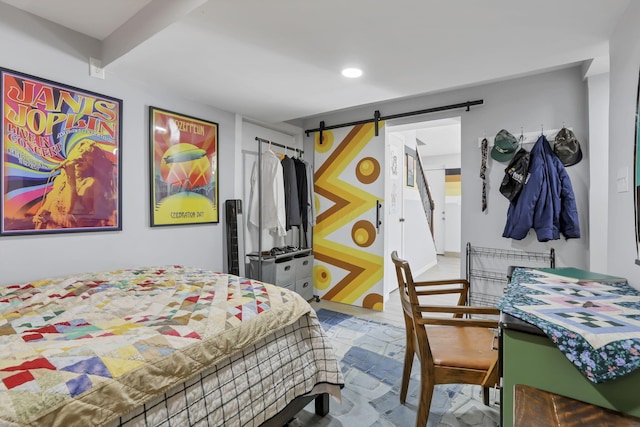 bedroom with a barn door