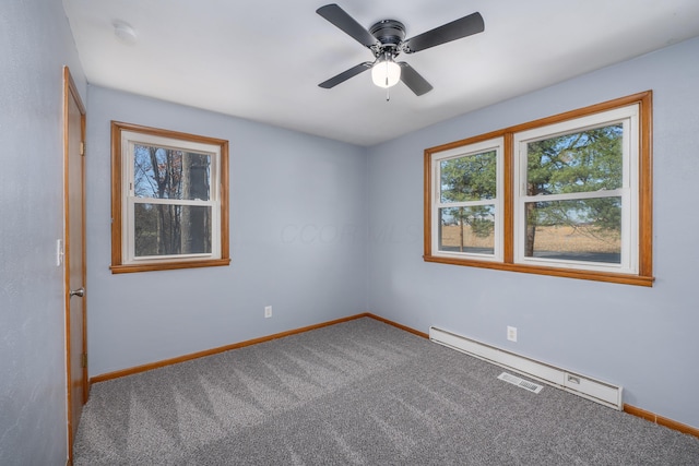 empty room with ceiling fan, carpet, and a baseboard radiator