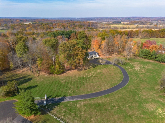 birds eye view of property featuring a rural view