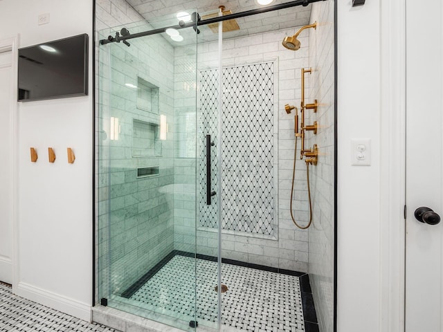 bathroom featuring tile patterned floors and a shower with door