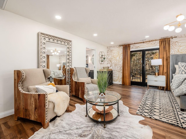 living area featuring french doors and dark hardwood / wood-style floors