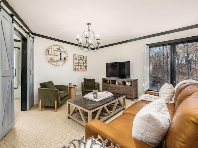 carpeted living room with a barn door, crown molding, and a chandelier