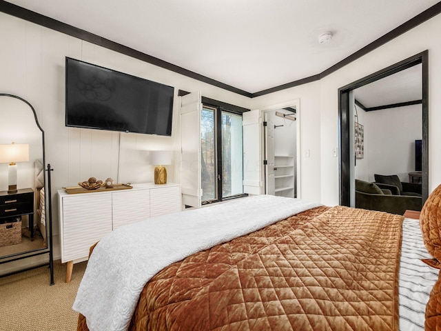 bedroom with carpet and ornamental molding