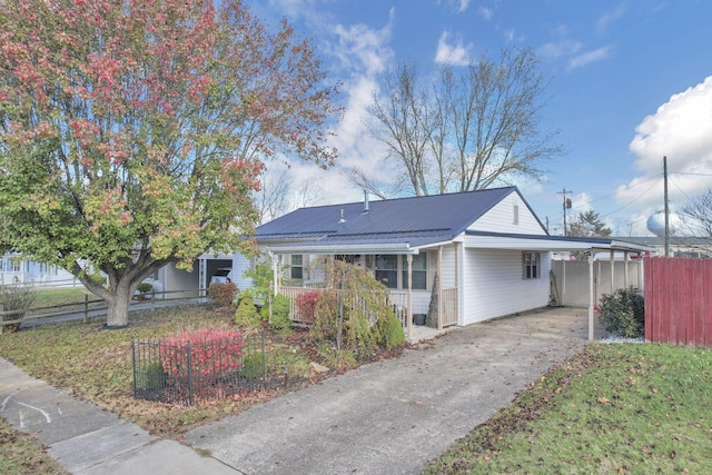 view of front facade with a carport