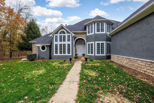 view of front property featuring a front yard