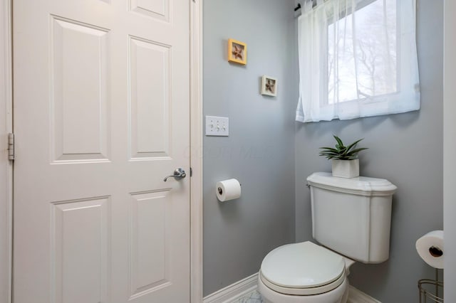 bathroom featuring toilet