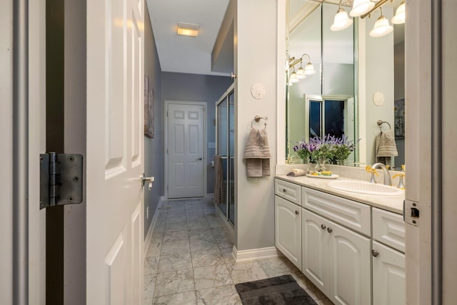 bathroom with vanity and walk in shower