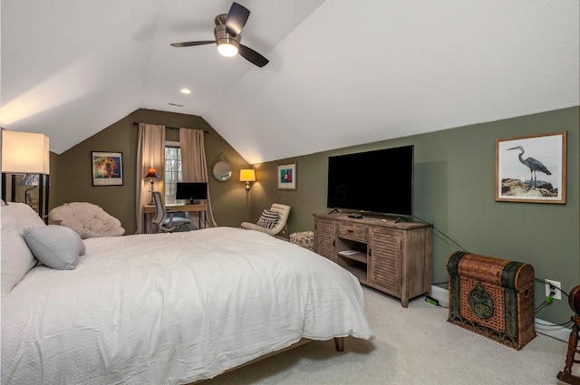 carpeted bedroom with vaulted ceiling and ceiling fan