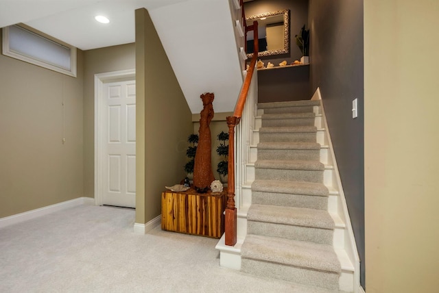 staircase with carpet