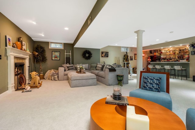 carpeted living room with bar area