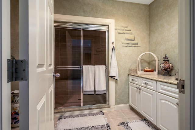 bathroom featuring tile patterned floors and vanity