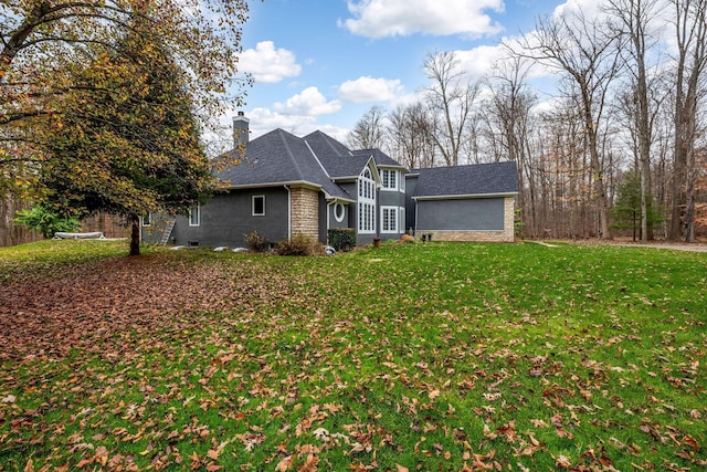 view of front of home with a front lawn