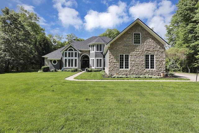 6003 Nichols Ln, Johnstown, OH 43031 - view of front of home featuring stone siding and a front lawn