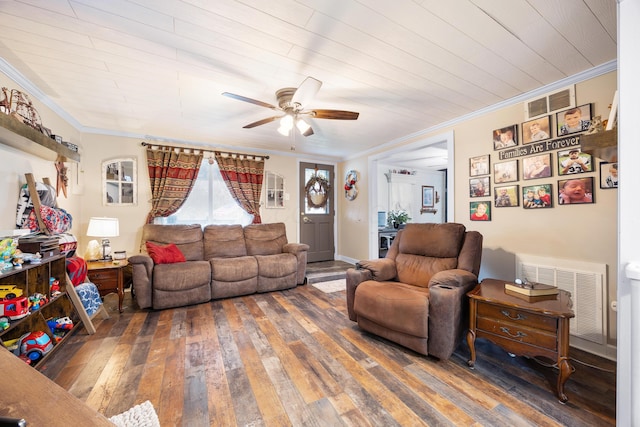 living room with dark hardwood / wood-style floors, ceiling fan, and ornamental molding