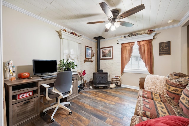 office space with a wood stove, ceiling fan, dark hardwood / wood-style flooring, crown molding, and wood ceiling