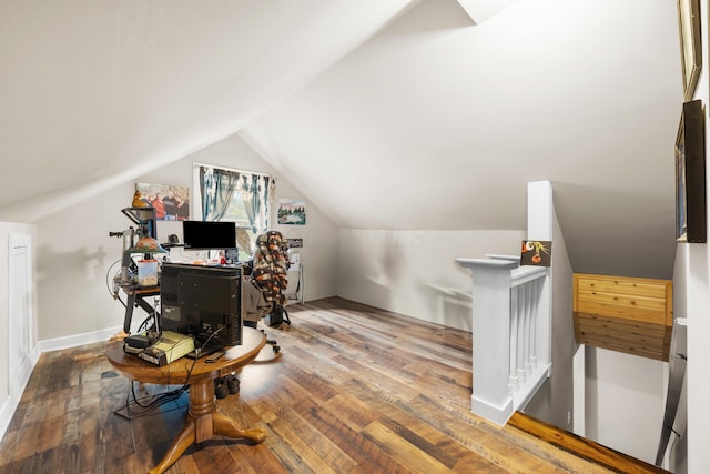 office featuring wood-type flooring and lofted ceiling