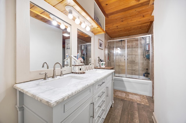 bathroom featuring combined bath / shower with glass door, wood-type flooring, vanity, and wooden ceiling