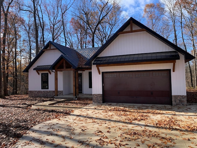 modern farmhouse featuring a garage