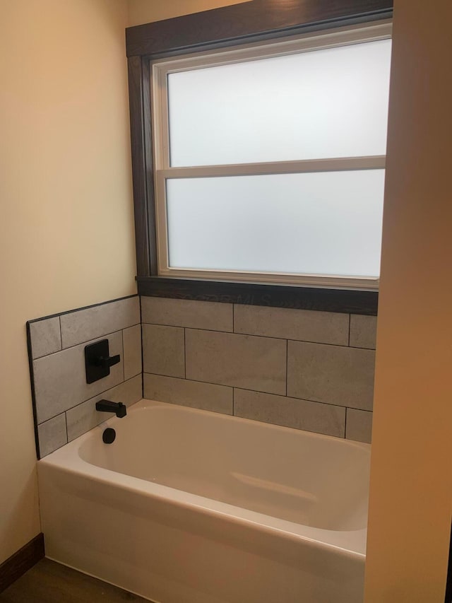 bathroom with a bath