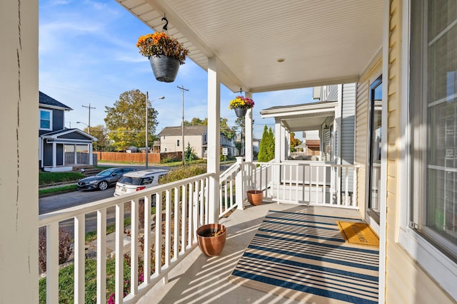 balcony featuring a porch