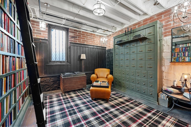 living area with brick wall