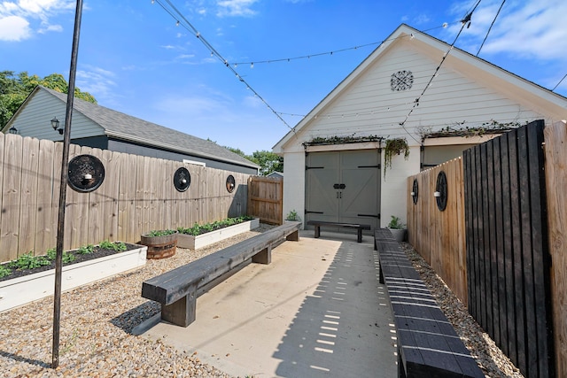 view of property exterior with a storage shed