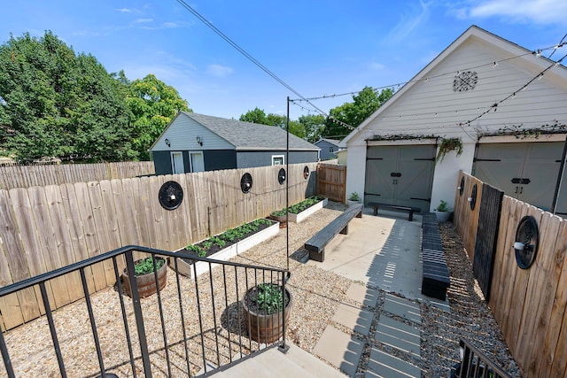 view of patio featuring a storage unit